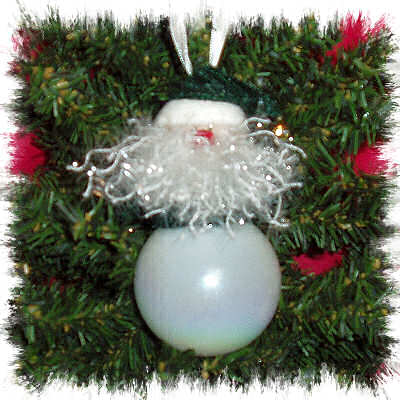 FUZZY GREEN-WHITE SANTA ORNAMENT